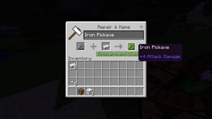 Can I repair an enchanted iron pickaxe with an iron ingot and an anvil?