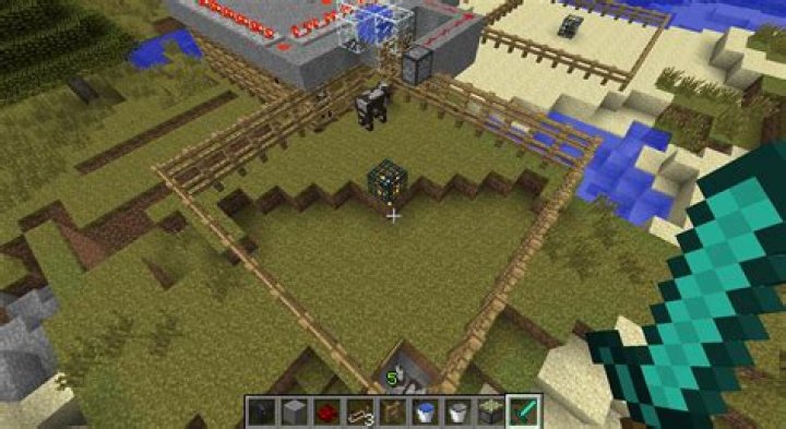 How do I set up a Cow Grinder in Minecraft?