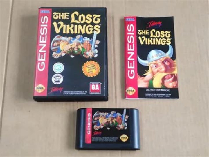 How do I switch focus in The Lost Vikings on Genesis?
