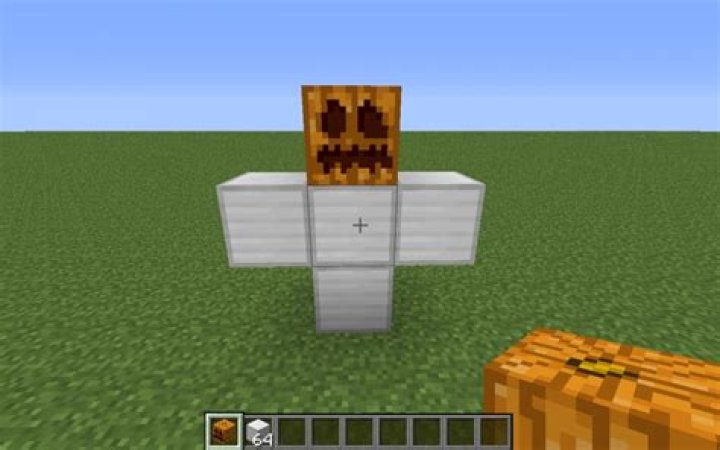 How do you spawn Iron Golems in Minecraft Pocket Edition?