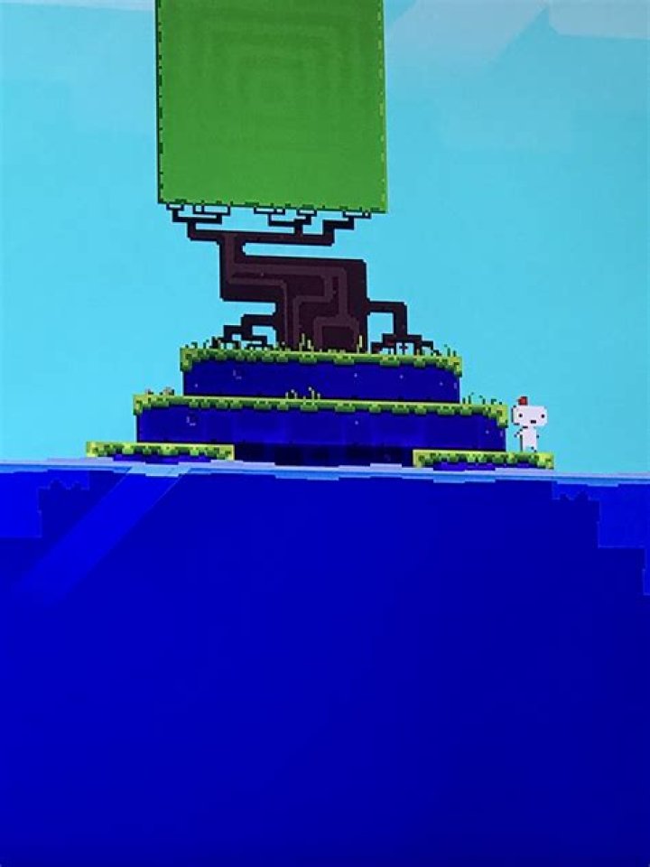 How in Fez do you lower the water on the bell side island with the tree and underneath a pyramid?