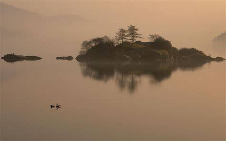 Is there any explanation for the Island of Myst or how the player arrives there?