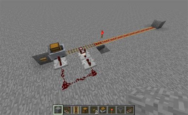 moving minecart once hopper has items, and then becomes empty