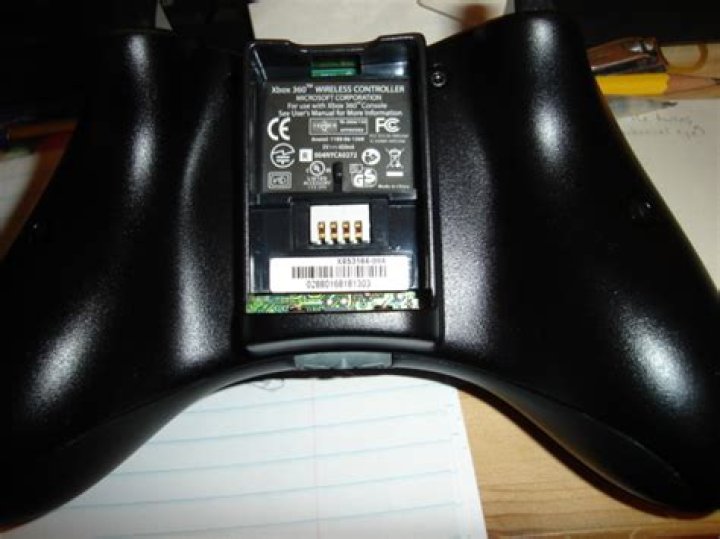 New Xbox 360 controller won't turn on with official charge pack but will with batteries?