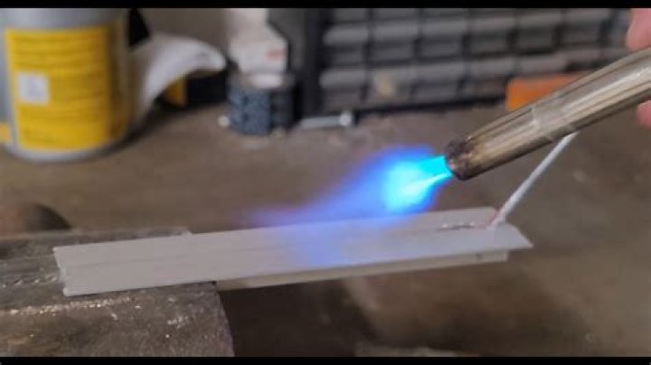 placing a torch under the dirt holding up the gravel