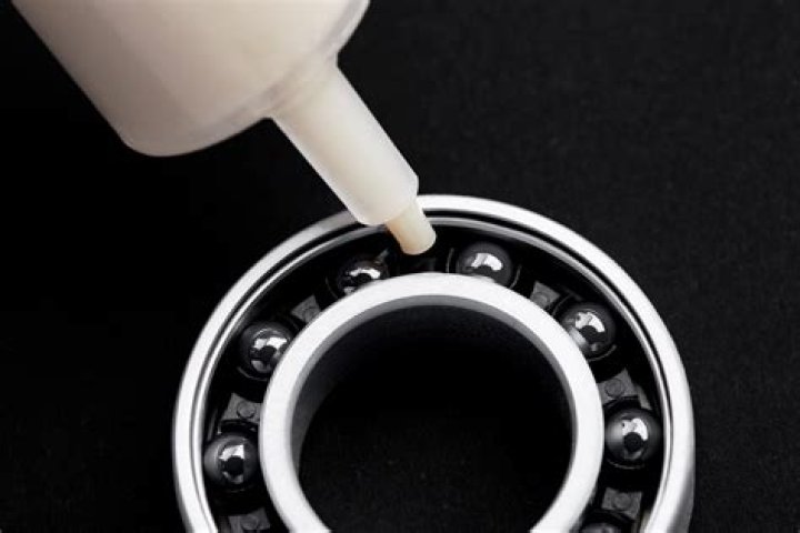 What lubricant does Sony use for the PS3 analog stick?