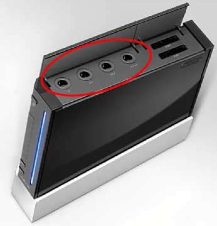 Wii with open GameCube ports cover